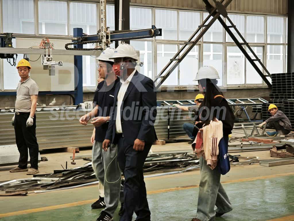 Ethiopian clients visiting Dorian factory for steel structure project discussions.