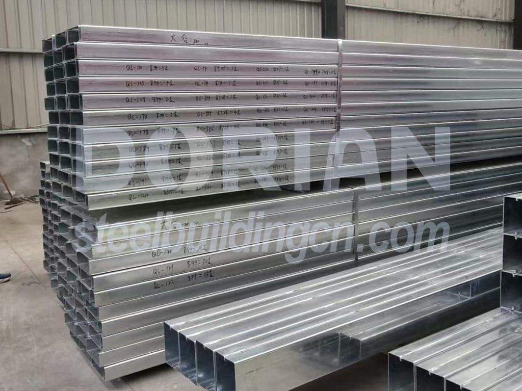 Steel building components including beams and frames for construction use.